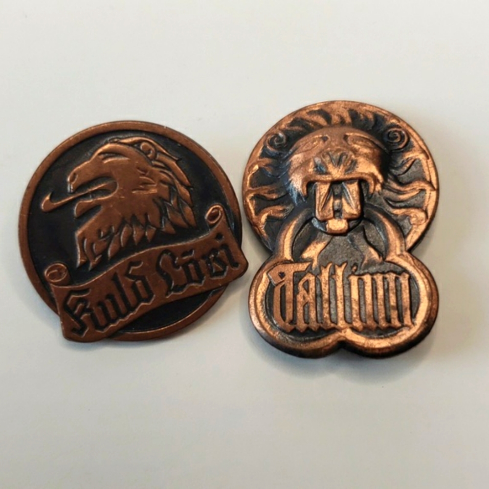 Set of 2 vintage copper and black Lion pin brooches